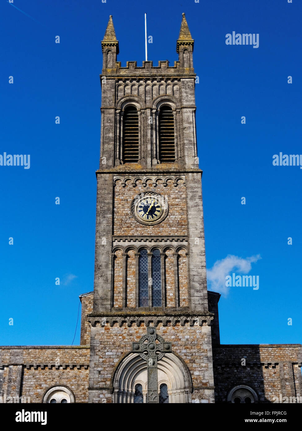 St Paul's Church dominates the High Street of Honiton, Devon, UK Stock Photo