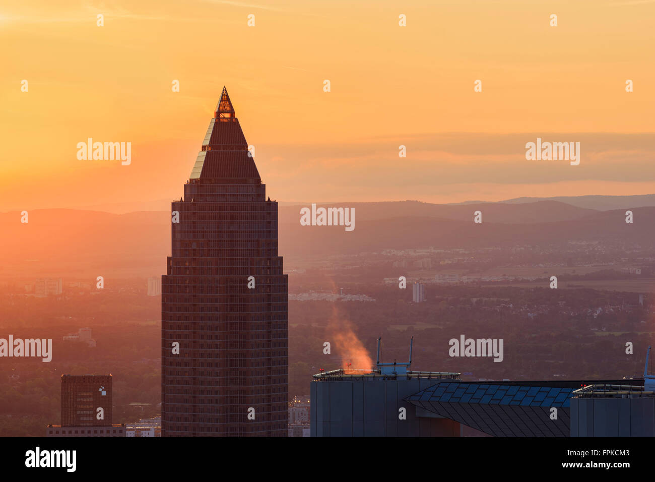 Europe, Germany, Hessen, Frankfurt, Messeturm at sunset Stock Photo