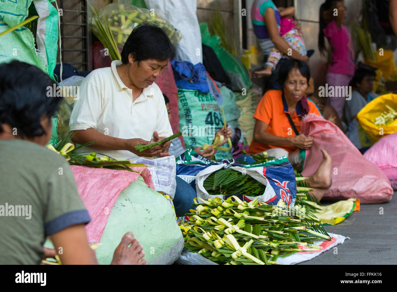 Downtown Cebu City,Philippines 19/3/2016.Filipino Vendors sit along the