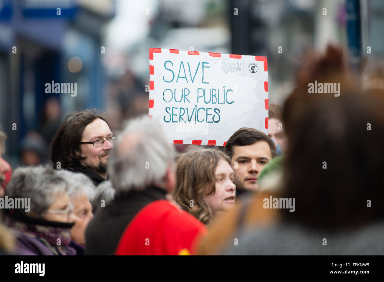 Aberystwyth, Wales, UK. 19th March, 2016. People holding banners and placards at a public protest in the centre of Aberystwyth to protest at the planned closure of the town's only post office and to move the services it provides to a ‘franchise' in a shop or store photo Credit:  keith morris/Alamy Live News Stock Photo