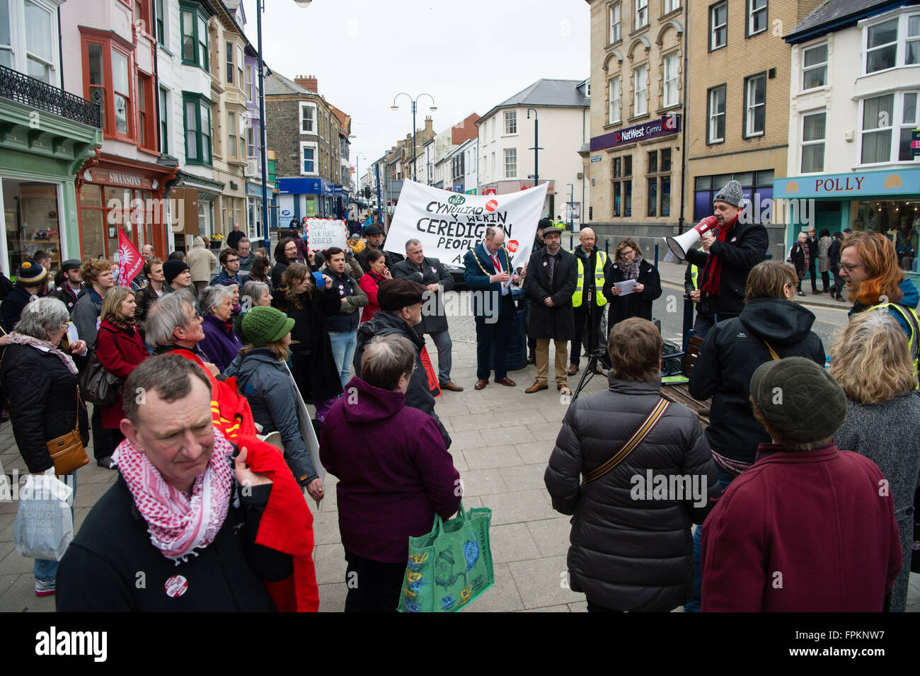 Aberystwyth, Wales, UK. 19th March, 2016. People at a public protest in the centre of Aberystwyth to protest at the planned closure of the town's only post office and to move the services it provides to a ‘franchise' in a shop or store photo Credit:  keith morris/Alamy Live News Stock Photo