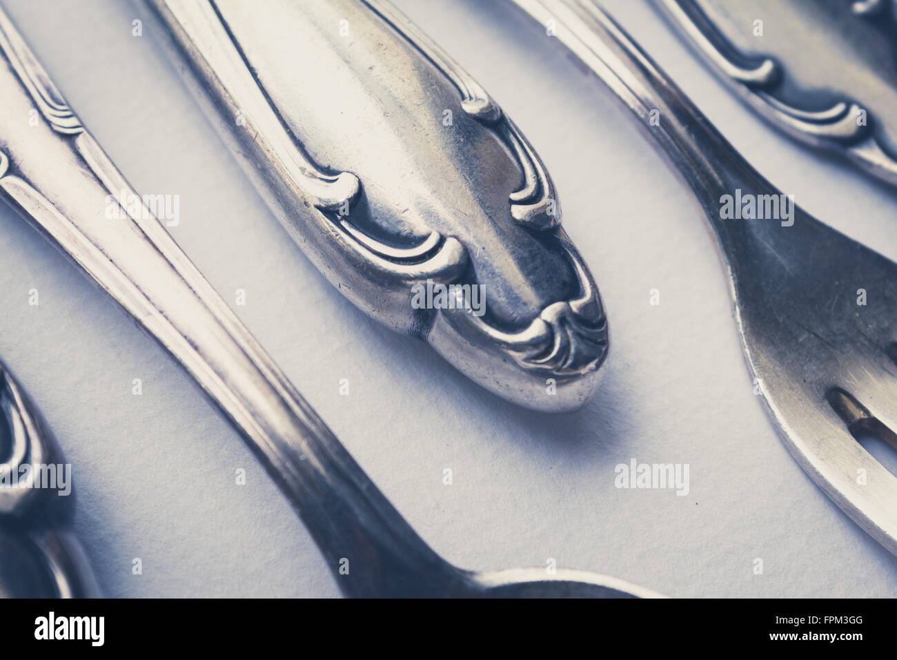 beautiful old silver cutlery closeup - vintage style Stock Photo