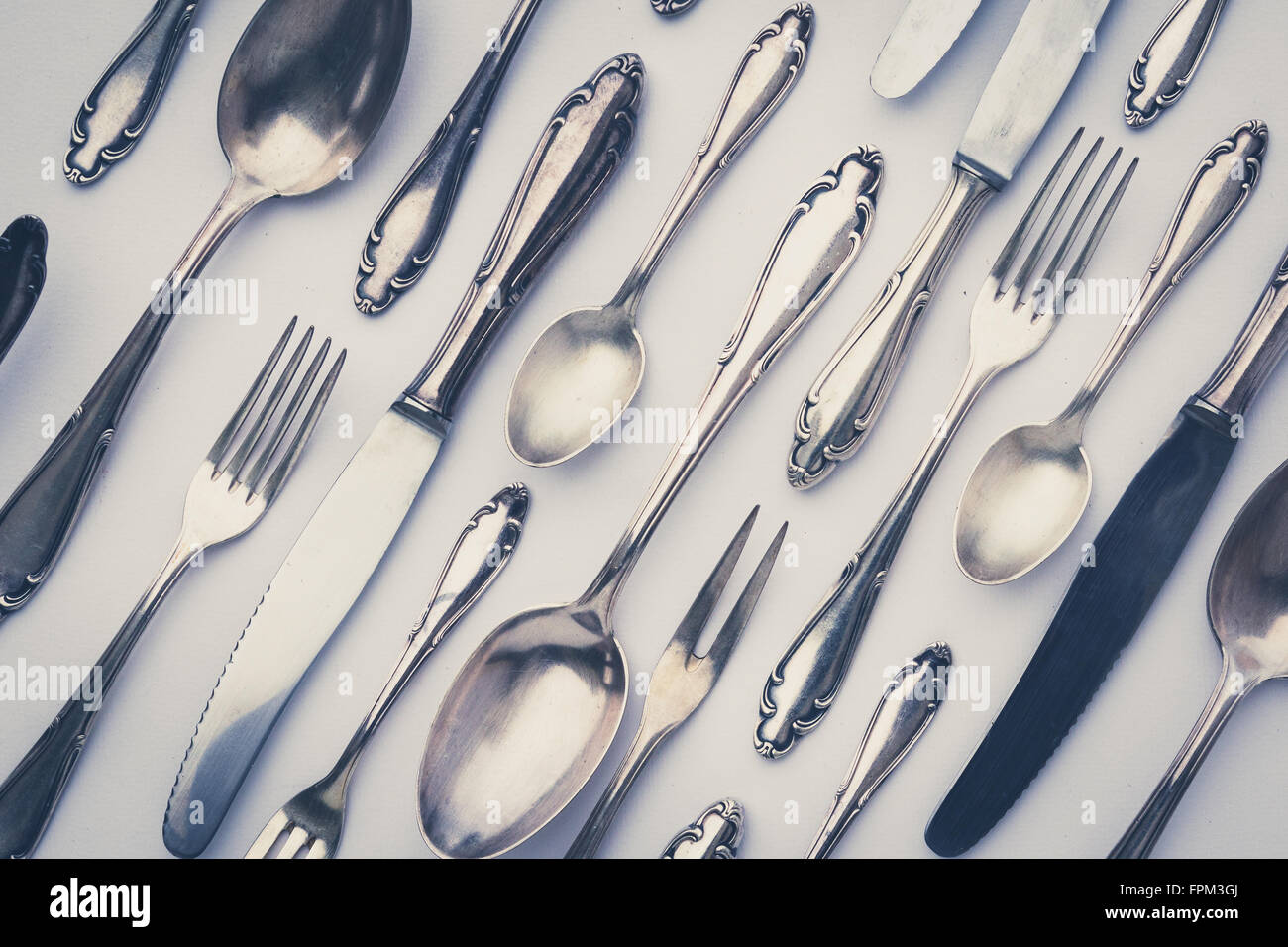 beautiful old silver cutlery  - vintage style filter Stock Photo