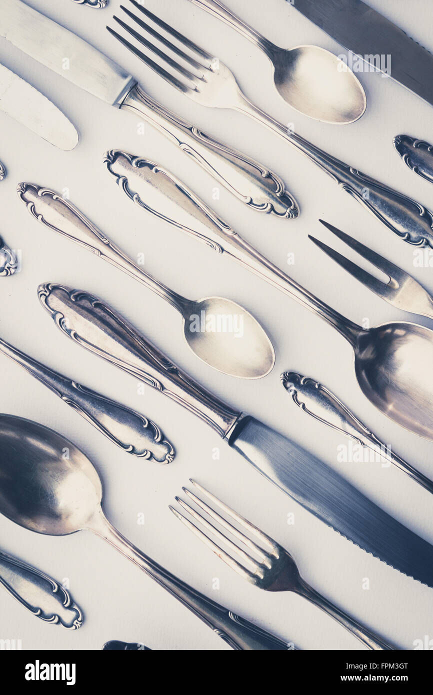 beautiful old silver cutlery  - vintage style filter Stock Photo