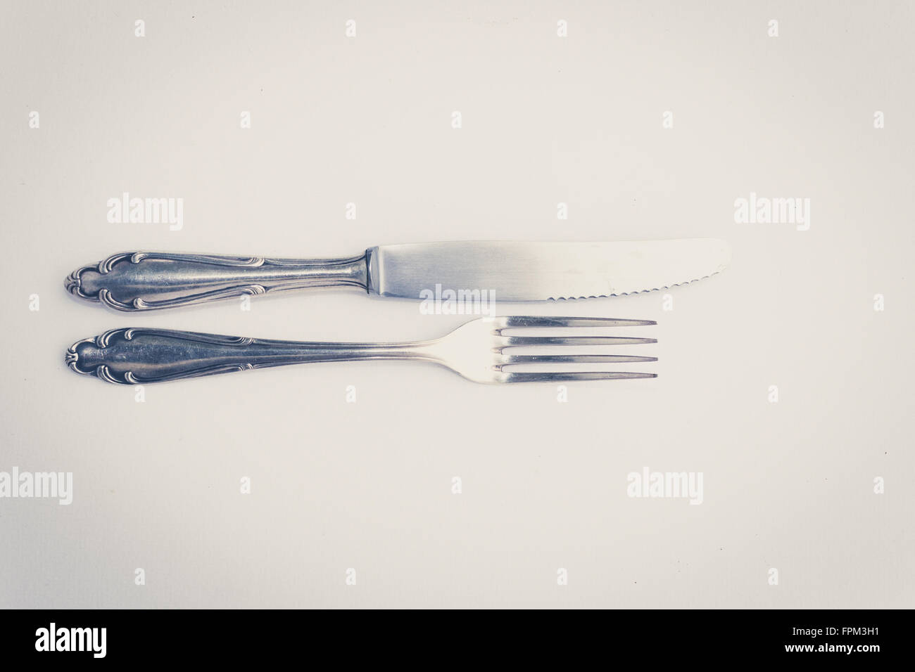 beautiful old silver cutlery , knife and fork vintage style Stock Photo