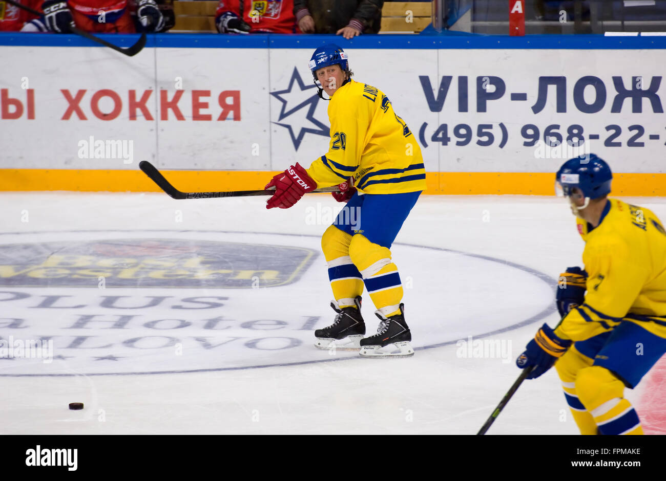 MOSCOW - JANUARY 29, 2016 Willy Lindstrom (20) dribble during hockey game Sweden vs Czech on League of World legends of Ice hockey championship in VTB ice arena, Russia