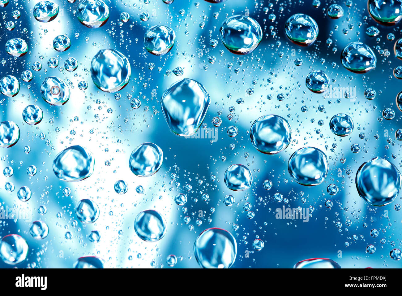 Abstract blue background with various water drops Stock Photo - Alamy