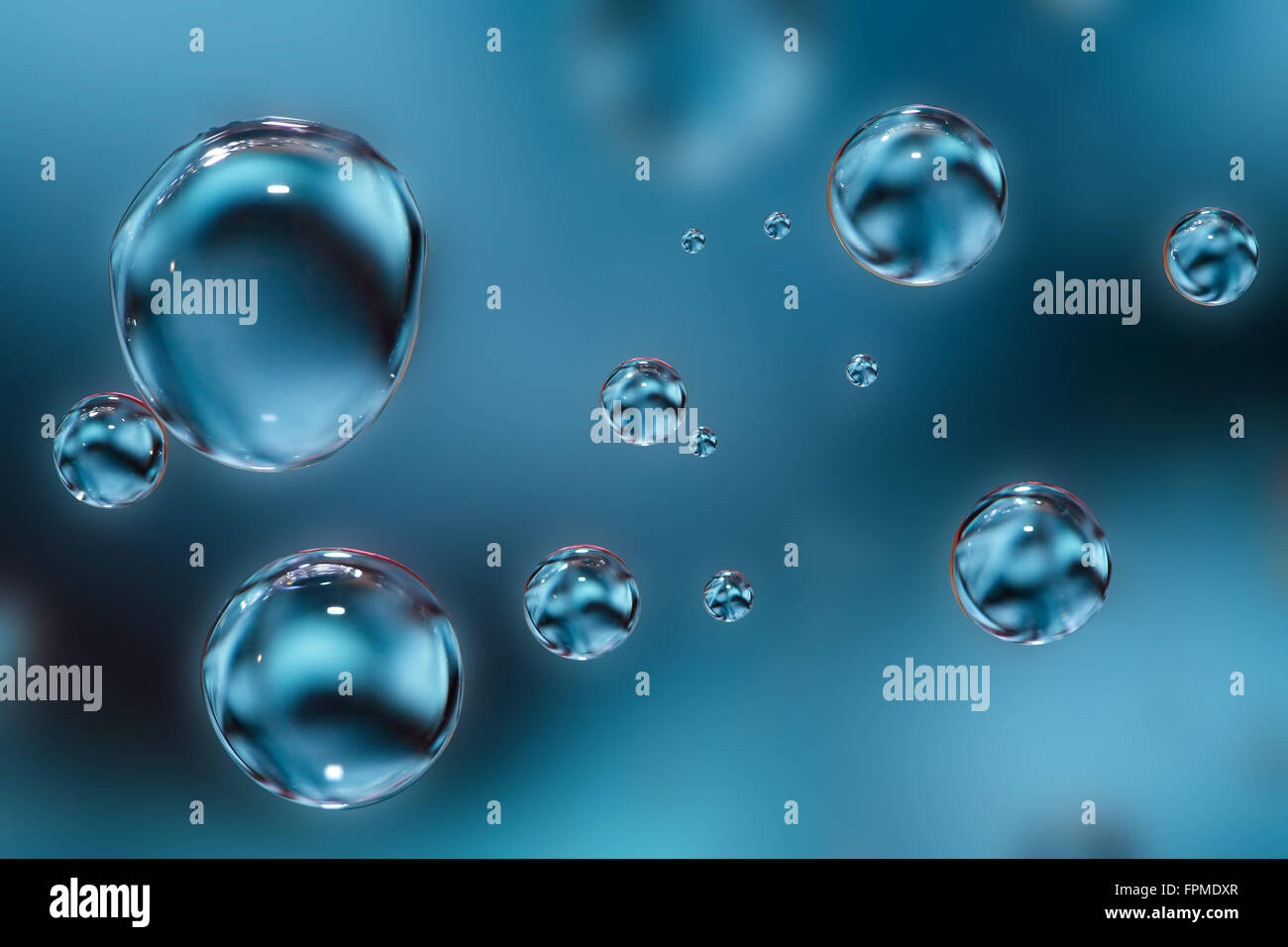 Abstract blue background with various water drops Stock Photo - Alamy