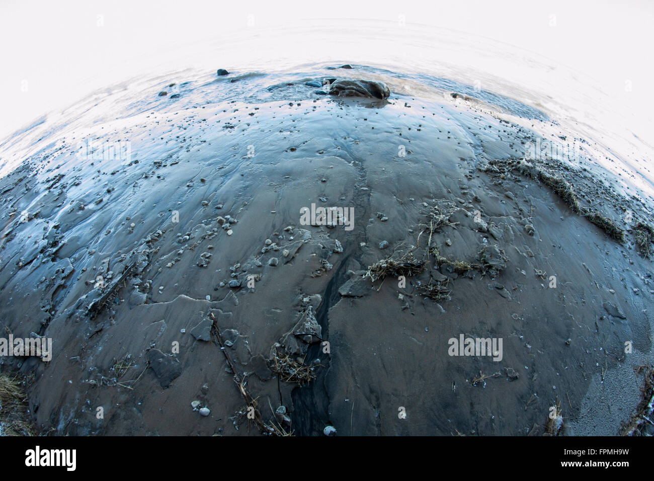 Fisheye lens of a frozen beach on the shoreline of Lake Michigan Stock