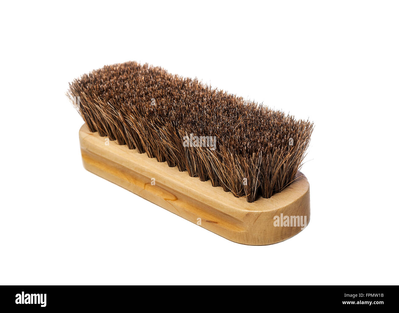 Clothes brush on a white background. Stock Photo