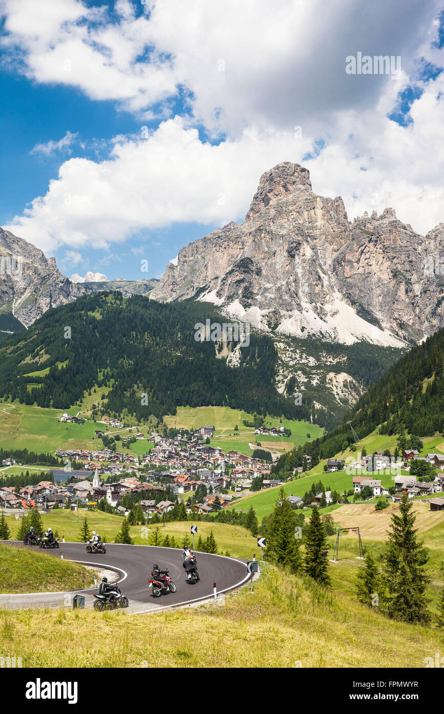 Motorcyclist, Corvara,in the background the Sassongher, the Dolomites, South Tyrol, Italy, Europe, Stock Photo