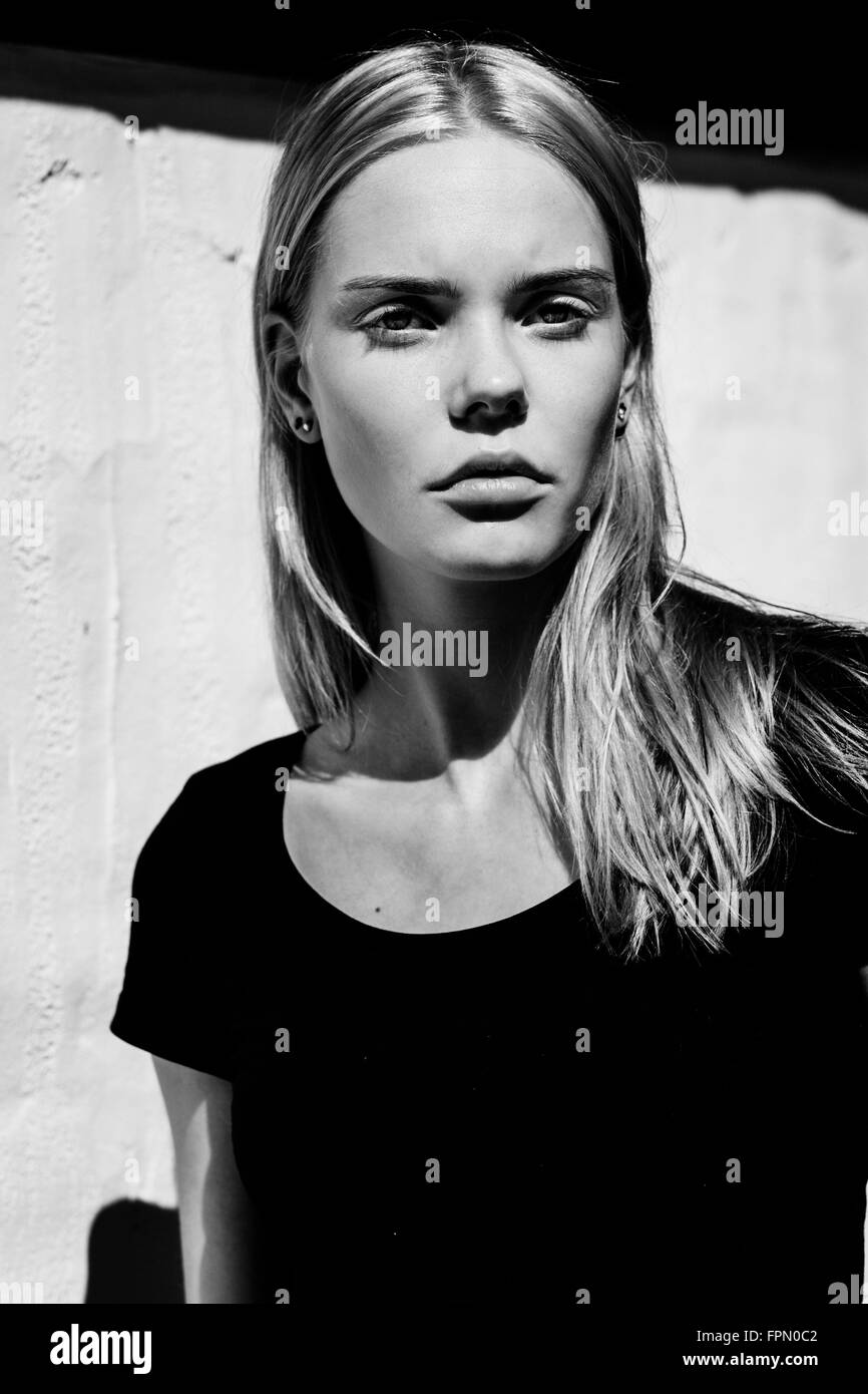 Serious young woman Stock Photo - Alamy