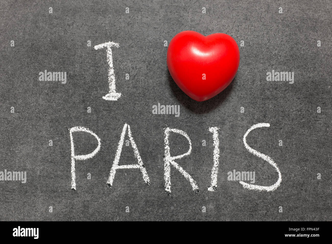 I love Paris phrase handwritten on school blackboard Stock Photo