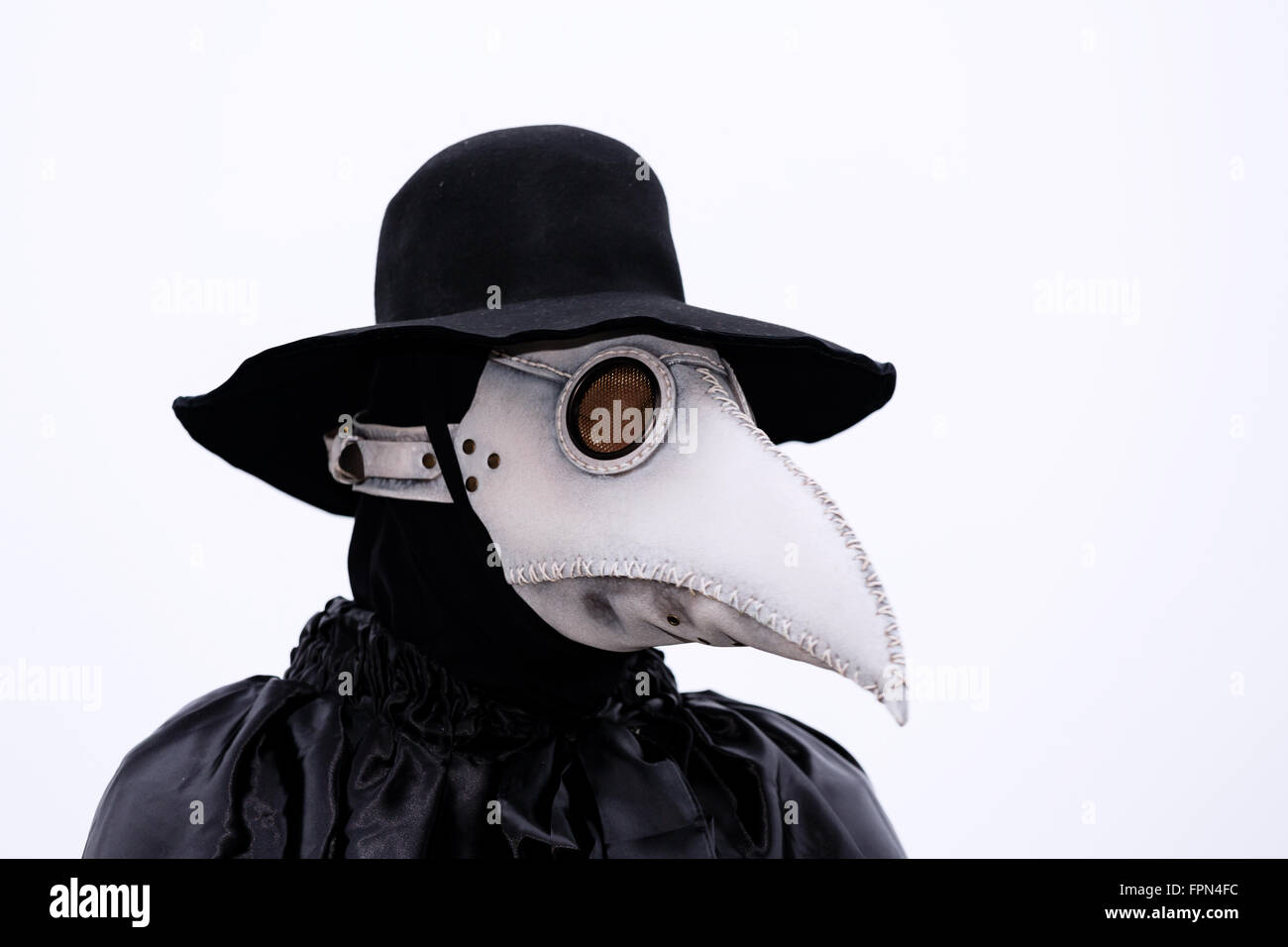 A man dressed in a medieval plague doctor costume, Venice, Italy Stock Photo