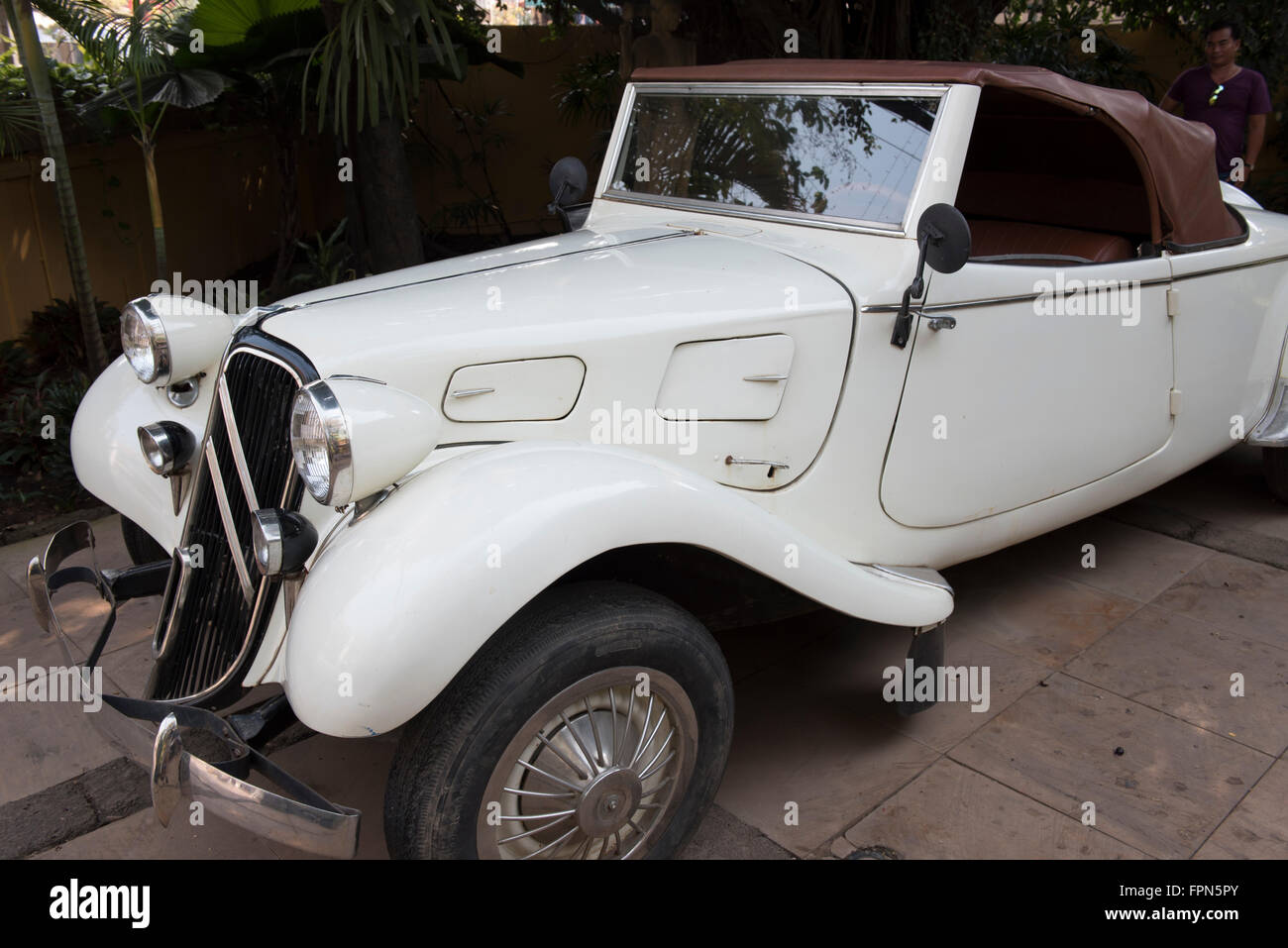 Siem Reap, Cambodia Classic vintage Citroen Traction Cabriolet 11B,  circa 1939, cream colour with a brown leather top Stock Photo