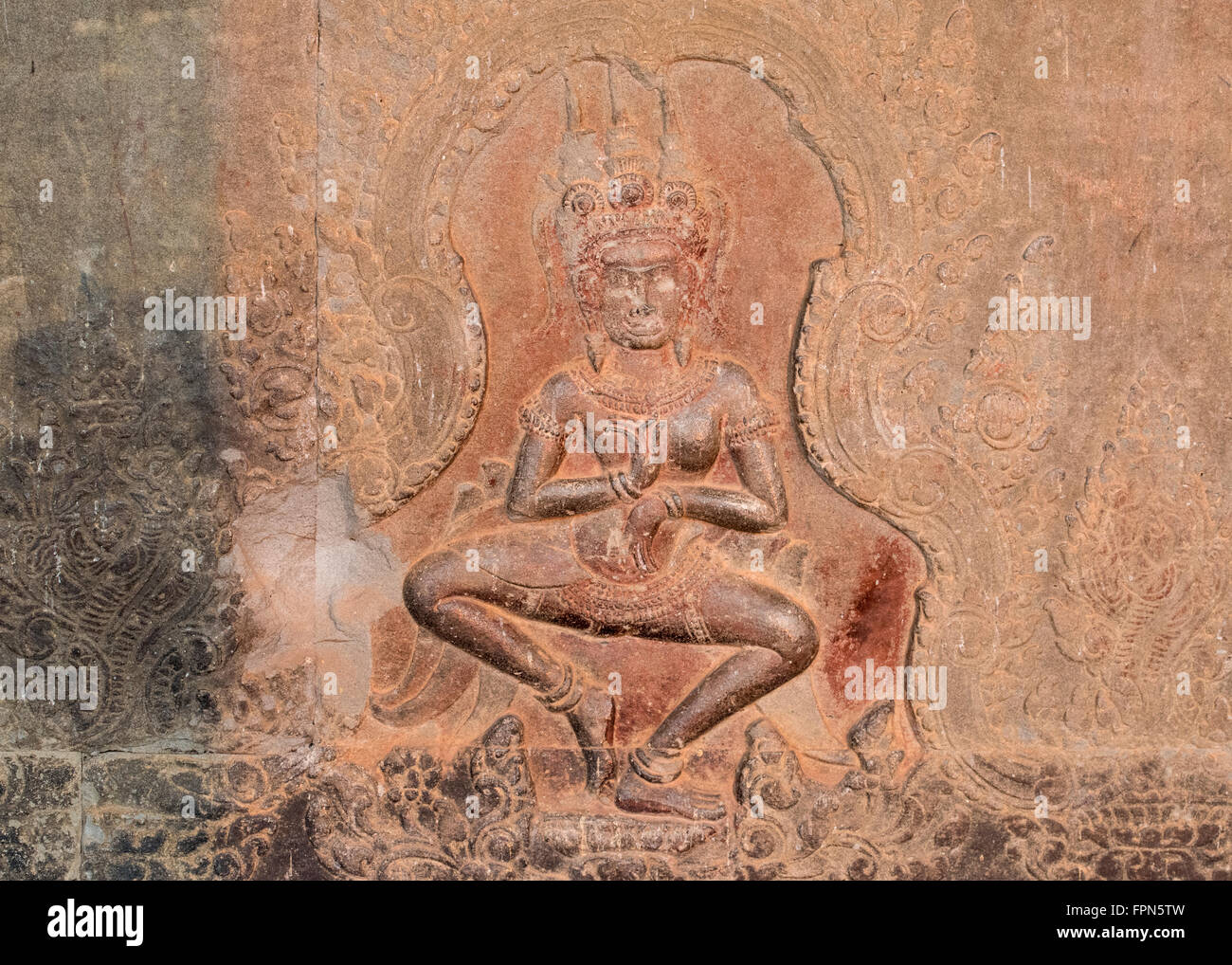 Angkhor Wat, Cambodia. Bas relief showing a dancing girl in the 11th temple of King  Century Suryavarmen II Stock Photo