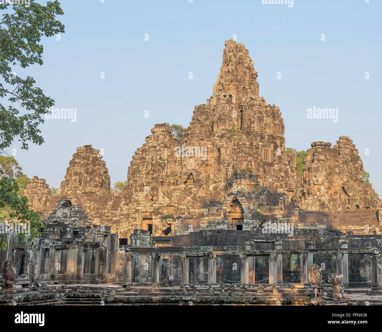 Bayon temple in Angkor Thom city  built by  King Jayavarman VII 1190-1210,  With the evening light illuminating the dramatic t Stock Photo