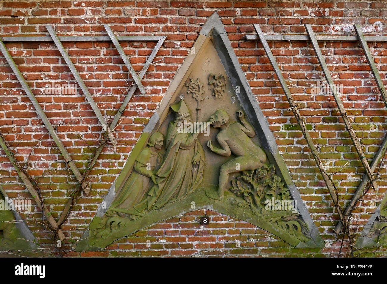 UTRECHT, THE NETHERLANDS - FEBRUARY 27, 2016: Flora's Hof Gothic religious facade in wall. Stock Photo