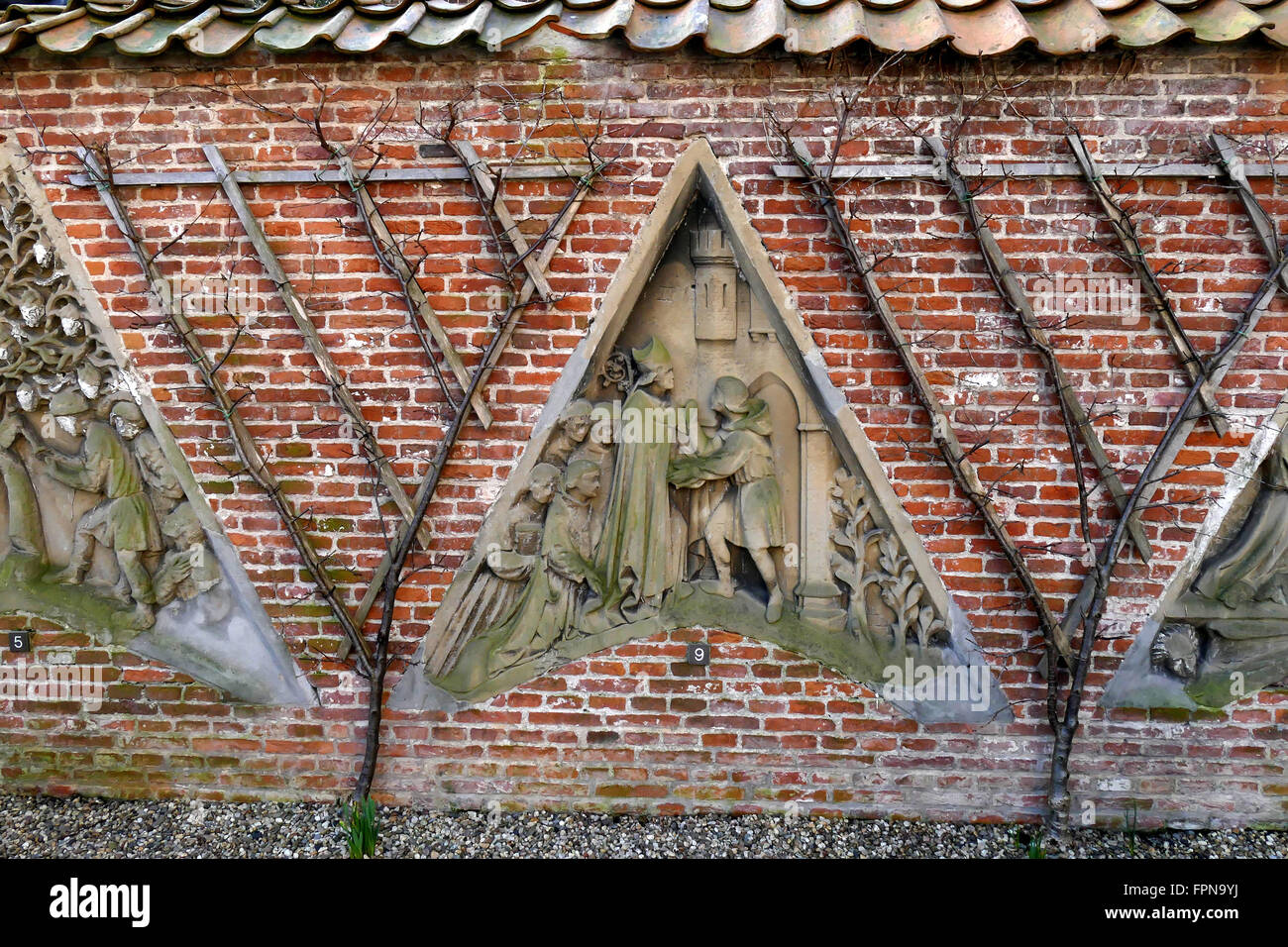 UTRECHT, THE NETHERLANDS - FEBRUARY 27, 2016: Flora's Hof Gothic religious facade in wall. Stock Photo