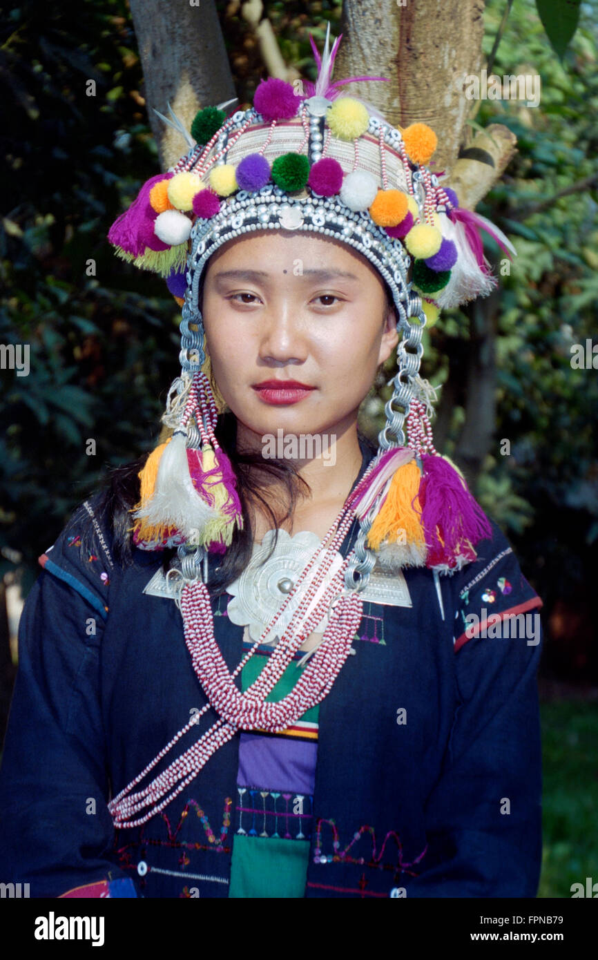 female in traditional minority dress at a living museum in jinghong ...