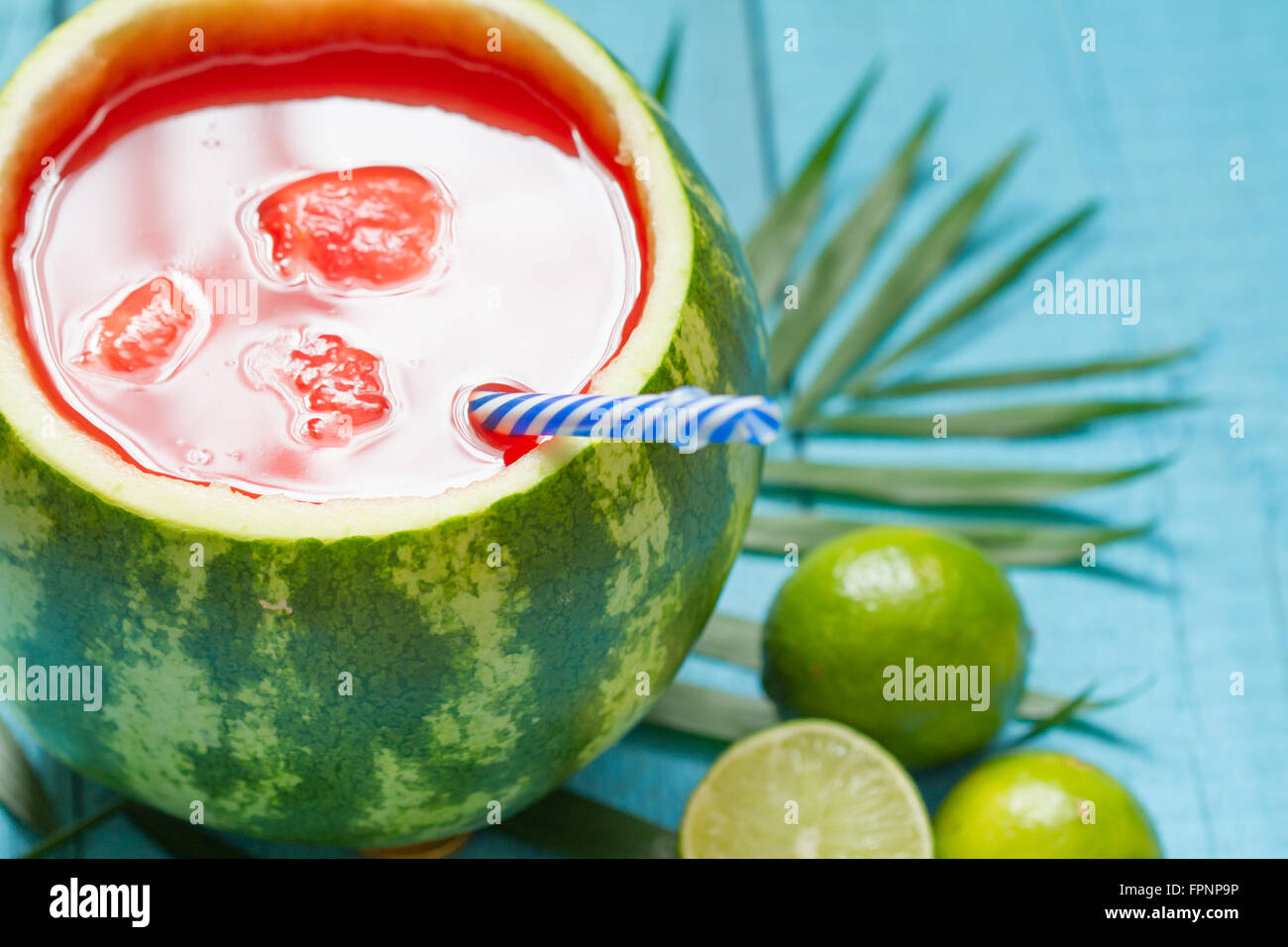 Exotic freshly squeezed juice with pineapple, watermelon and coconut closeup Stock Photo