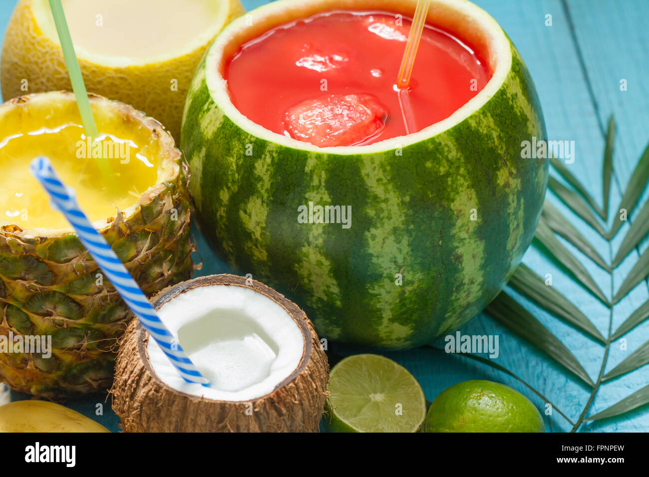 Exotic freshly squeezed juice with pineapple, watermelon and coconut closeup Stock Photo