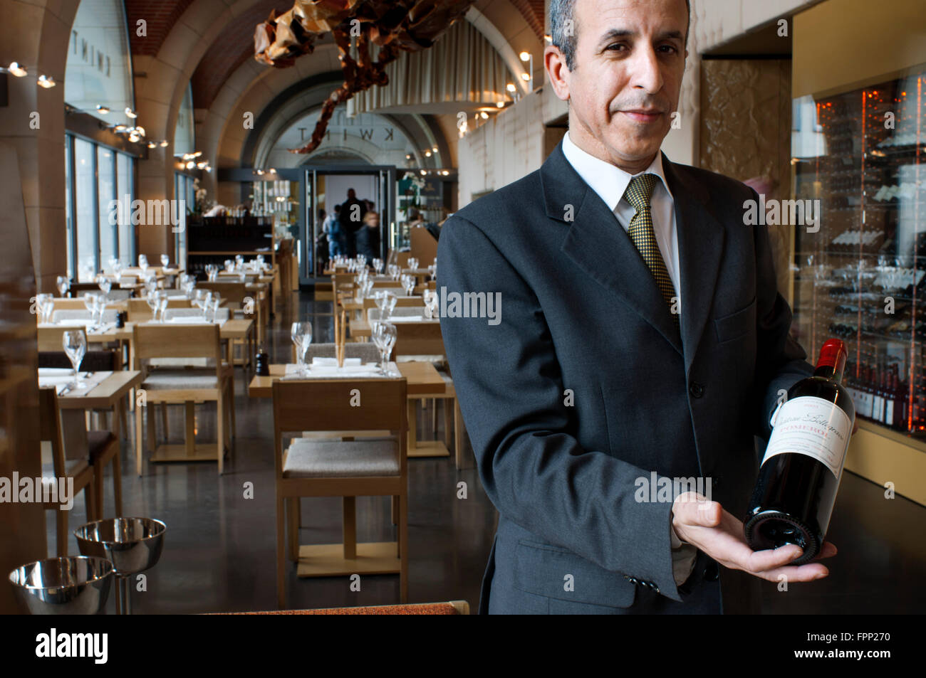 Sommelier of Kwint restaurant, Brussels, Belgium. Kwint is an upscale restaurant with modern twist, thanks to its unconventional Stock Photo