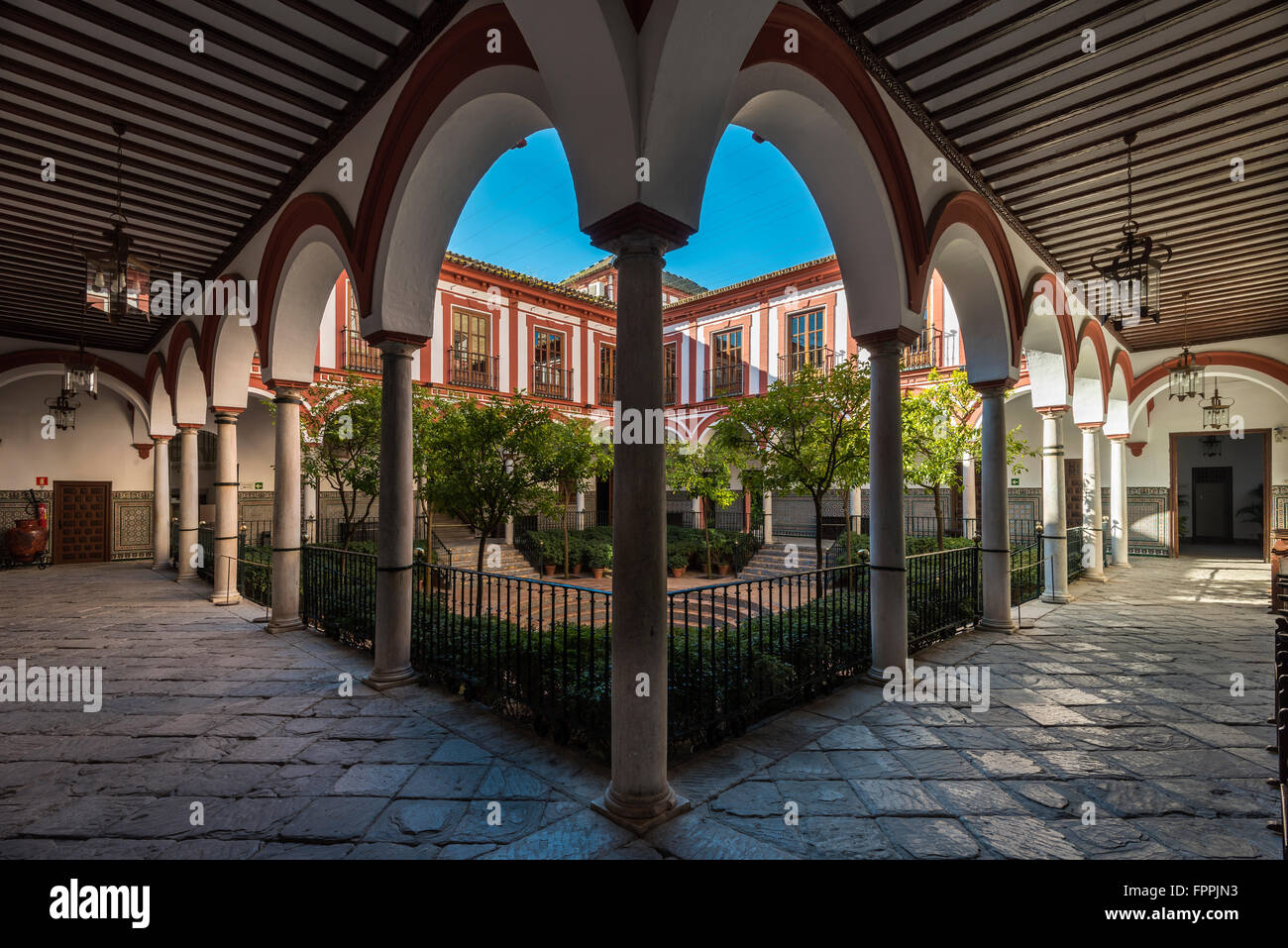 Inner courtyard of the Hospital of the Venerable Priests, Seville, Andalusia, Spain Stock Photo