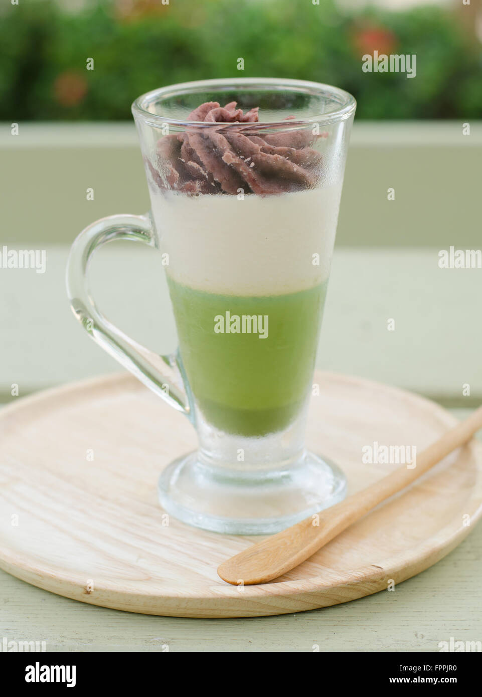 Green tea and red bean pudding in a glass Stock Photo - Alamy