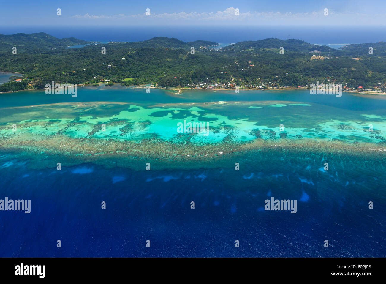 How Big Is Roatan Aerial image of Roatan island and reef Stock Photo - Alamy