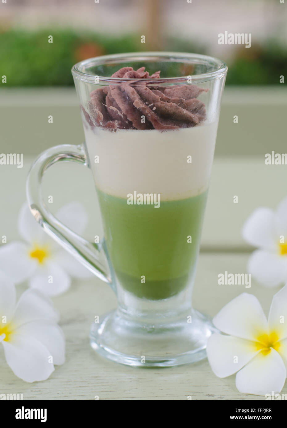 Green tea and red bean pudding in a glass Stock Photo