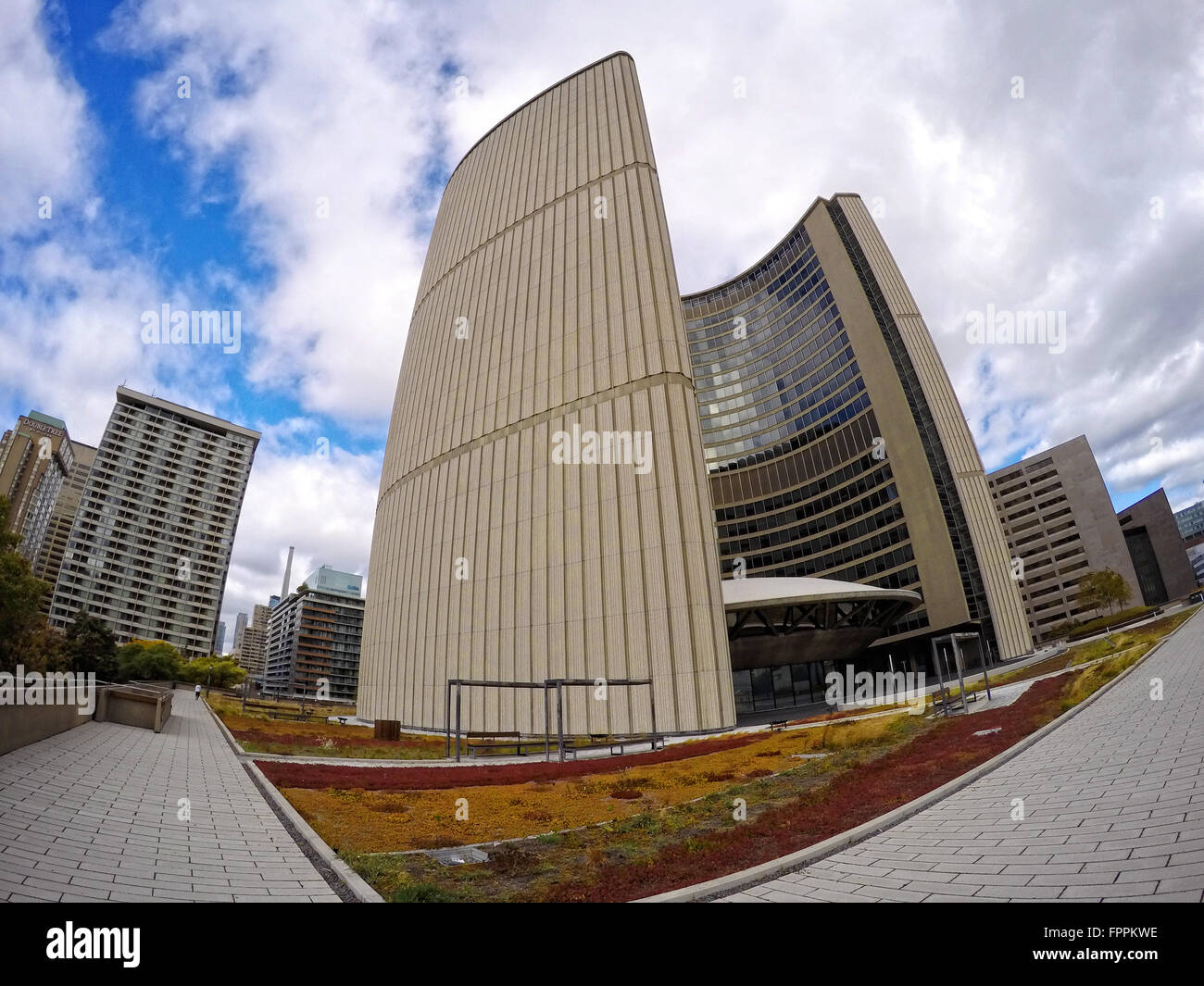 Toronto City Hall Green Podium Roof Garden under white clouds in blue sky in autumn Stock Photo
