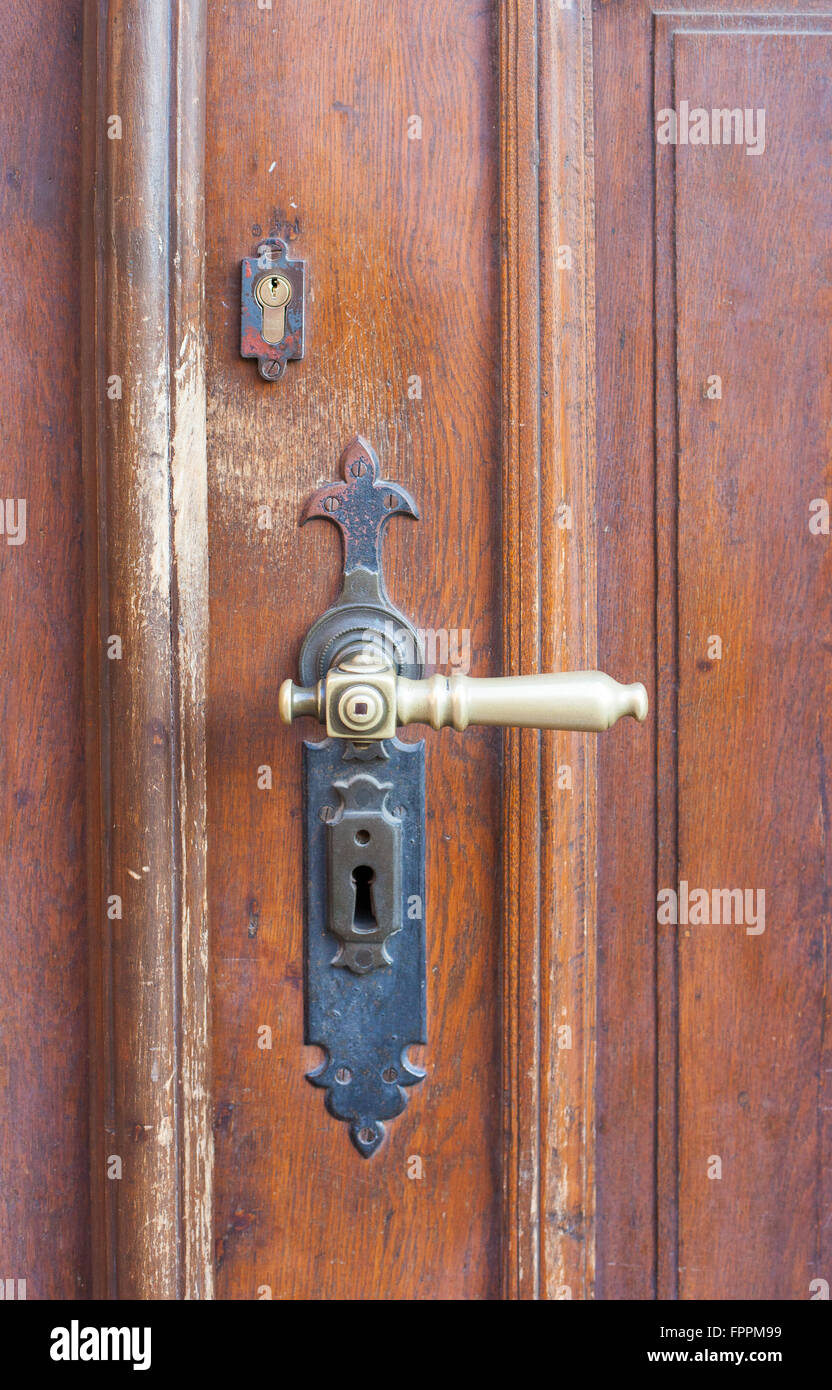 Close up of old door handle on a door in Prague Stock Photo