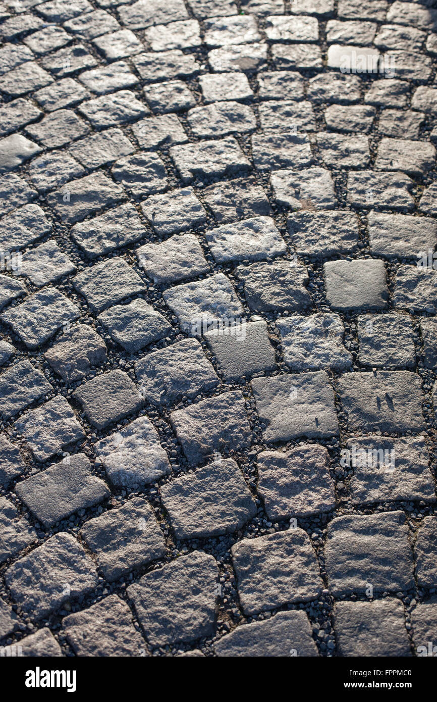 Old cobblestone street in afternoon light Stock Photo