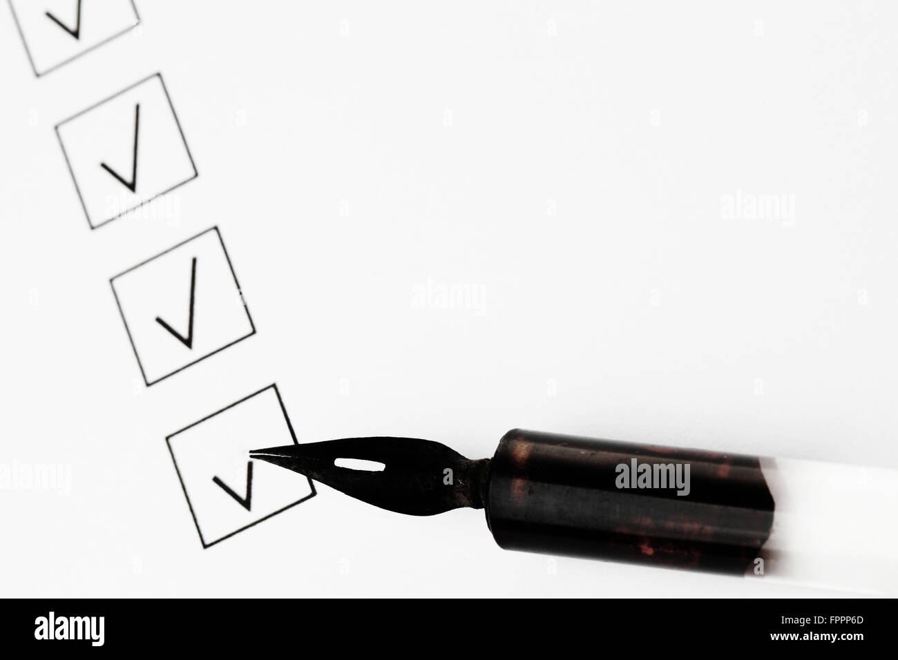 Check boxes and pen isolated on white background Stock Photo - Alamy