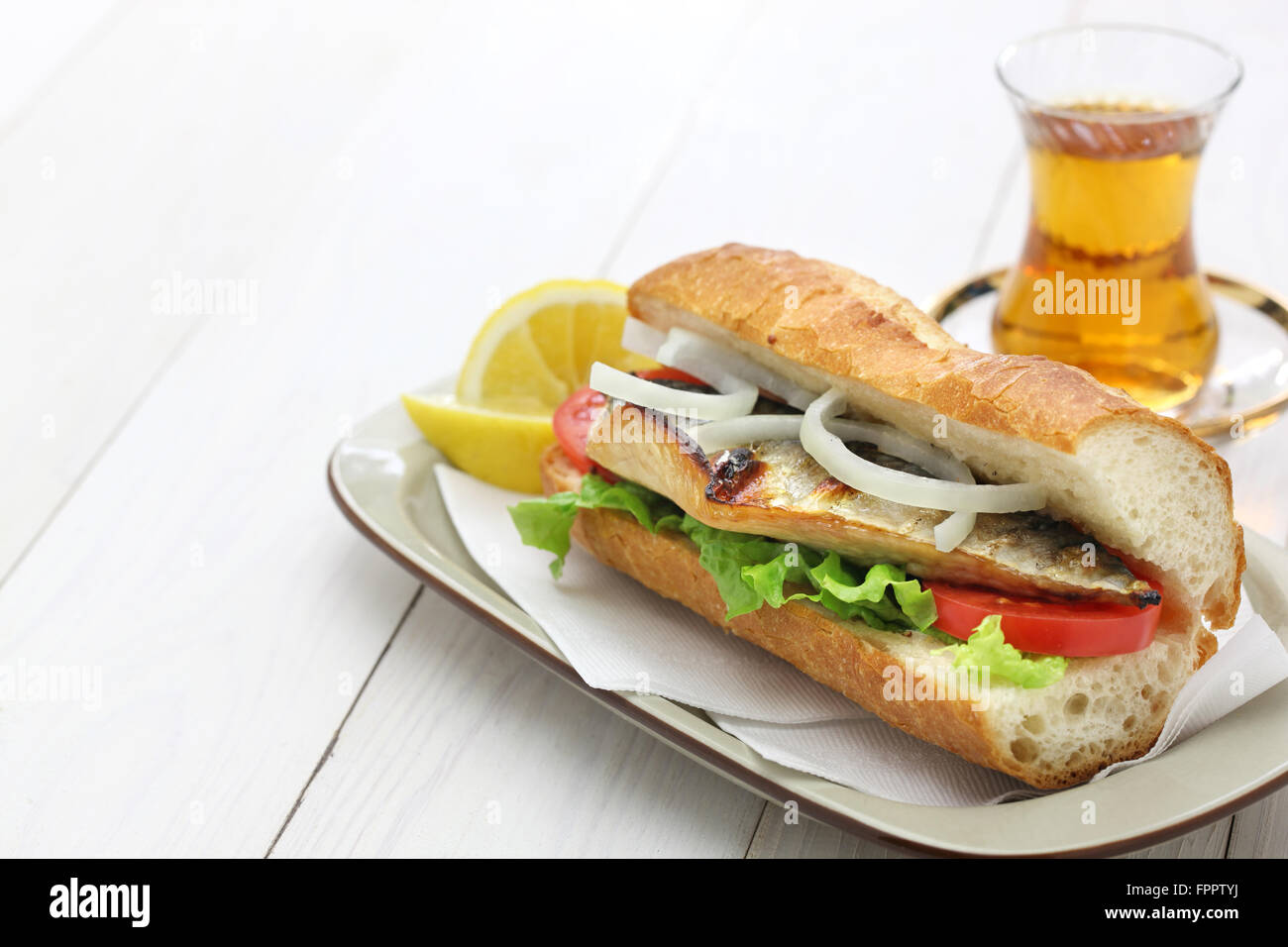 mackerel fish sandwich and a glass of tea,turkish food Stock Photo Alamy
