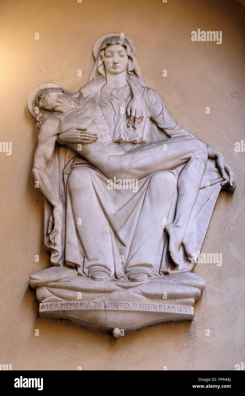 Pieta, statue on the house facade in Florence, Italy, on June 05, 2015 Stock Photo