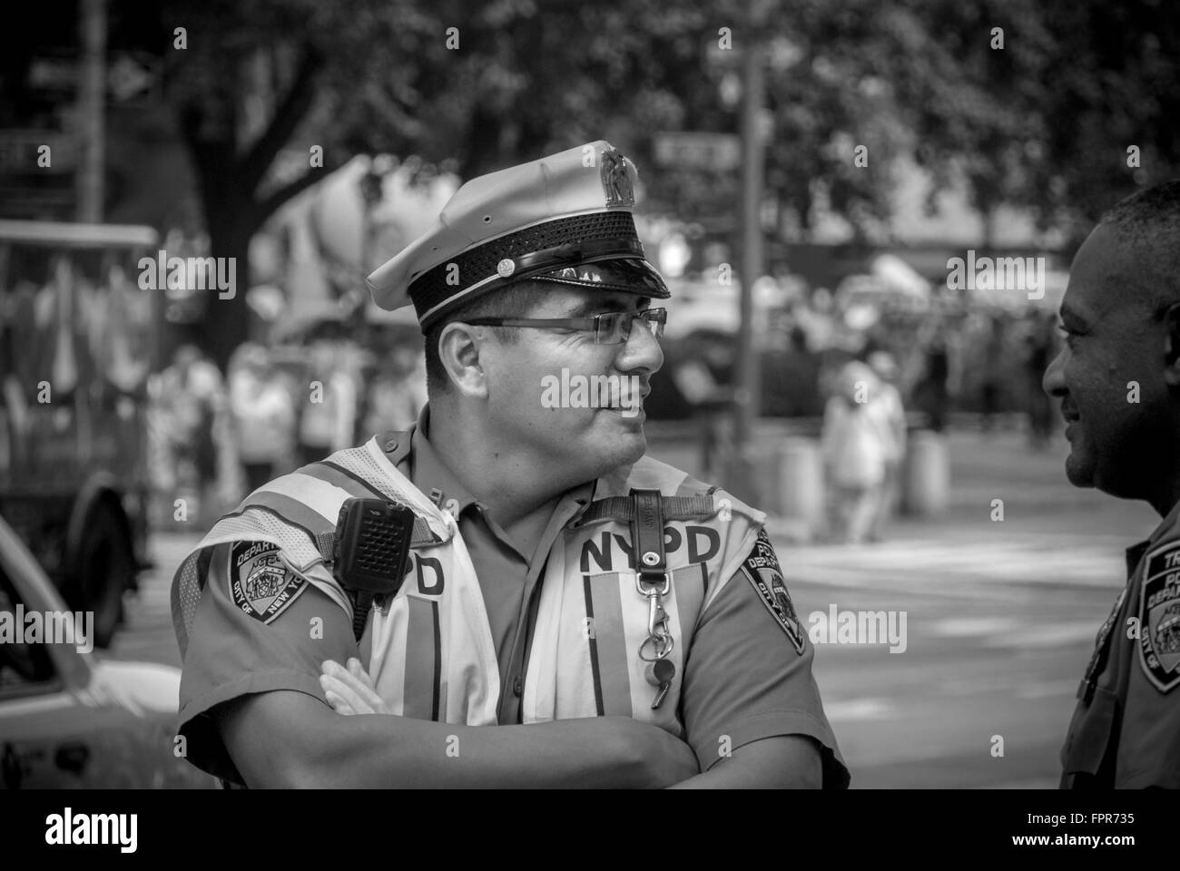 NYPD Traffic Officer chatting to colleague, New York City, USA. Stock Photo