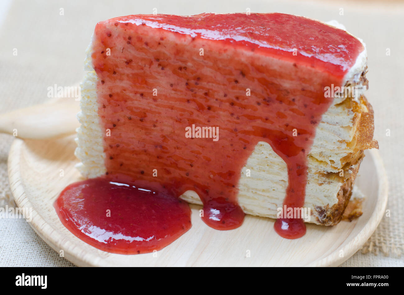 crepe cake with strawberry sauce Stock Photo