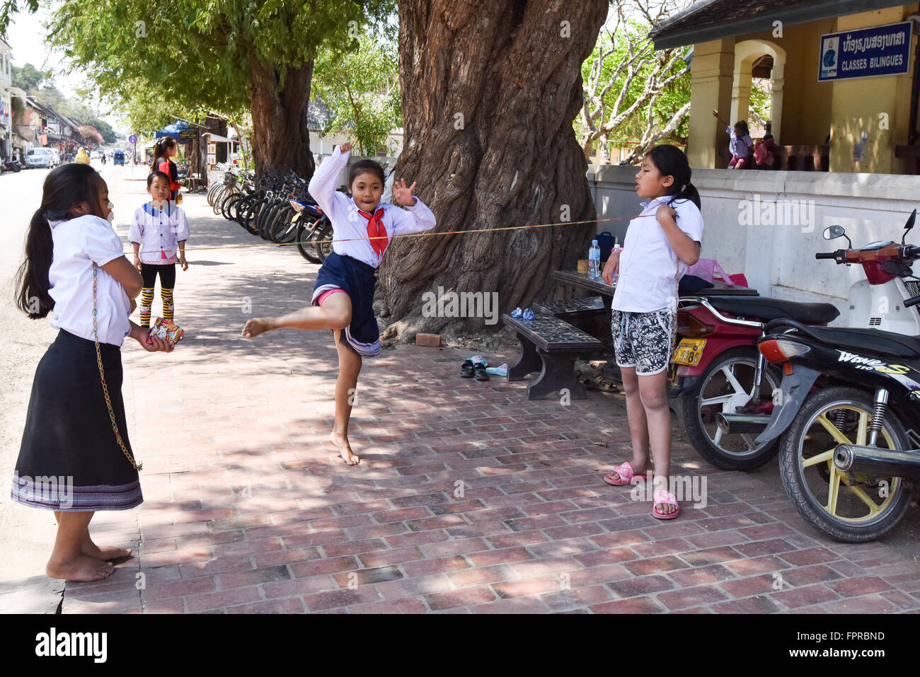 Schoolgirls Practicing sports Luang Prabang Laos Stock Photo