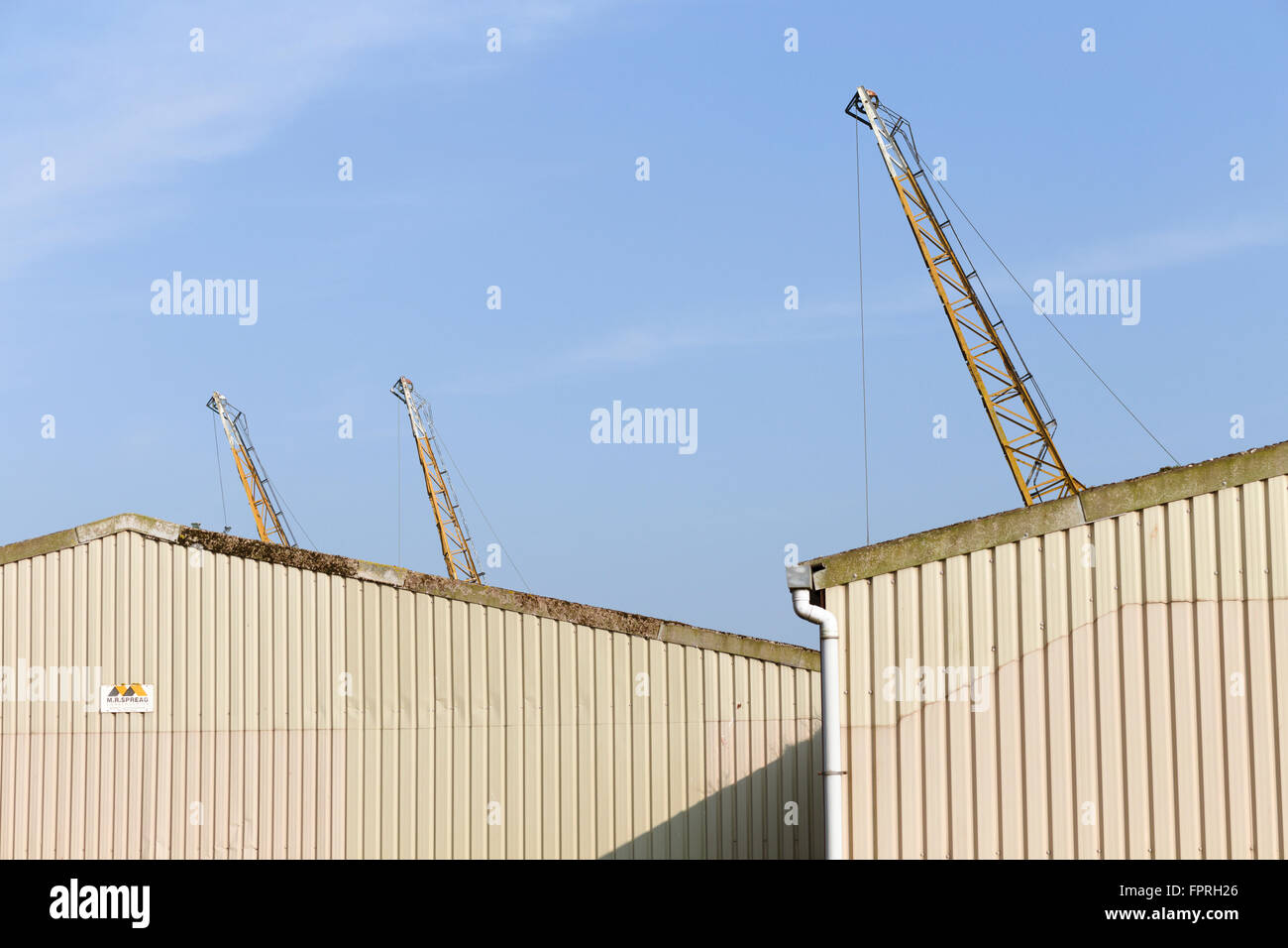 Warehouses and cranes at Sharpness Docks, South Gloucestershire, UK. Stock Photo