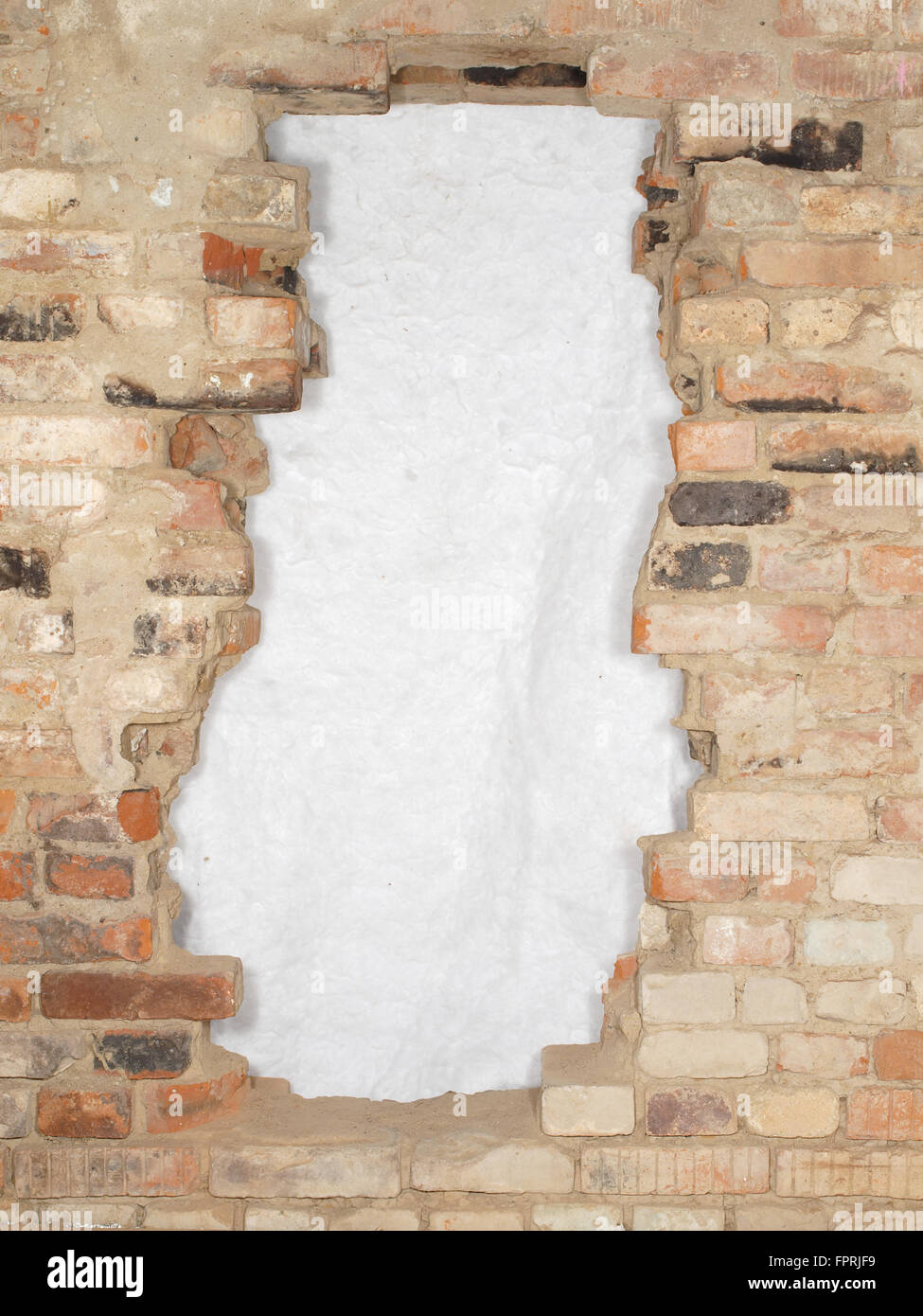 Break the old brick wall consisting of a variety of bricks Stock Photo ...