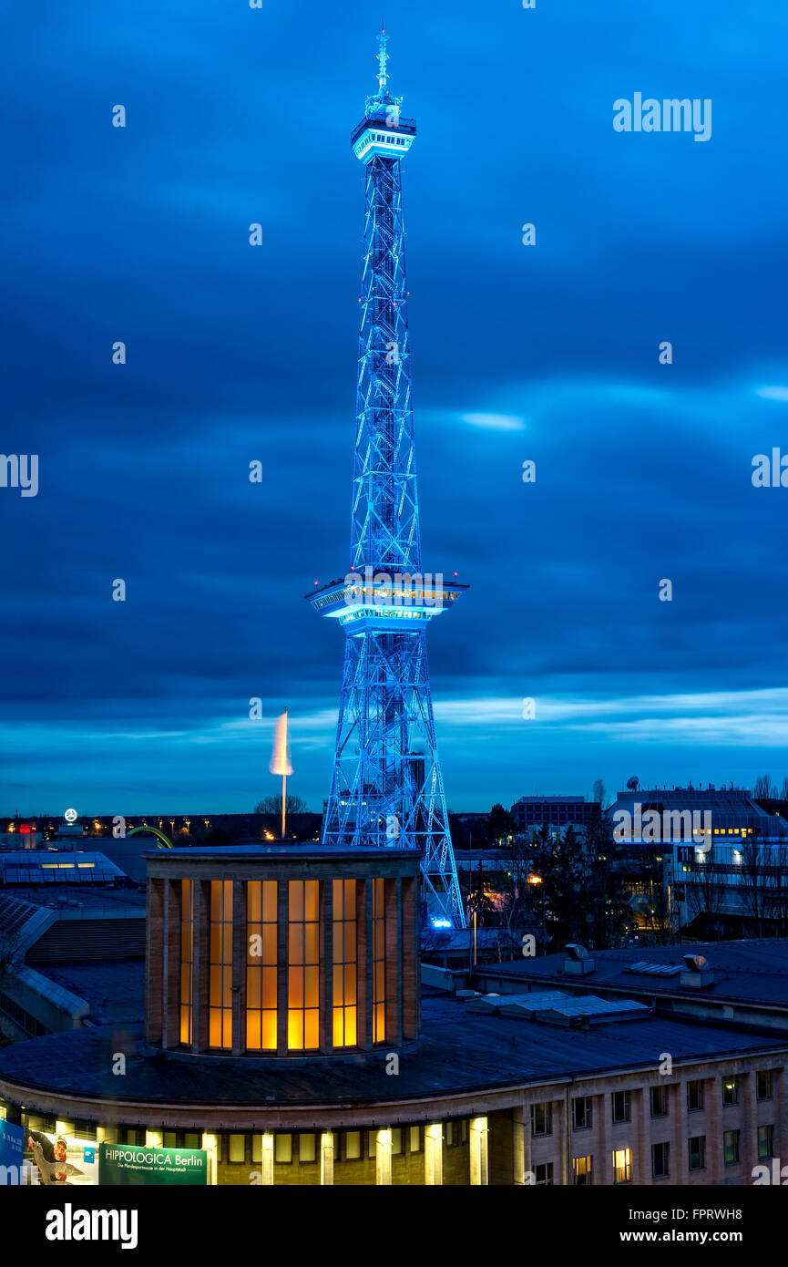 Blue illuminated radio tower at dusk, Hall 16, exhibition grounds, Messe Berlin, Berlin, Germany Stock Photo
