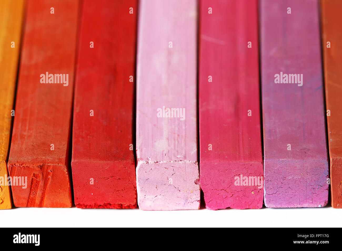 Crayons - range of warm colors Stock Photo