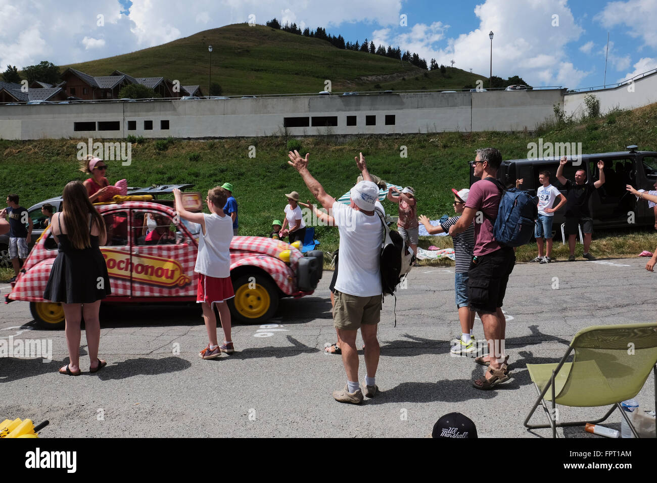 Tour de France spectators waiting for commercial presents from the sponsors in the caravan cars Stock Photo