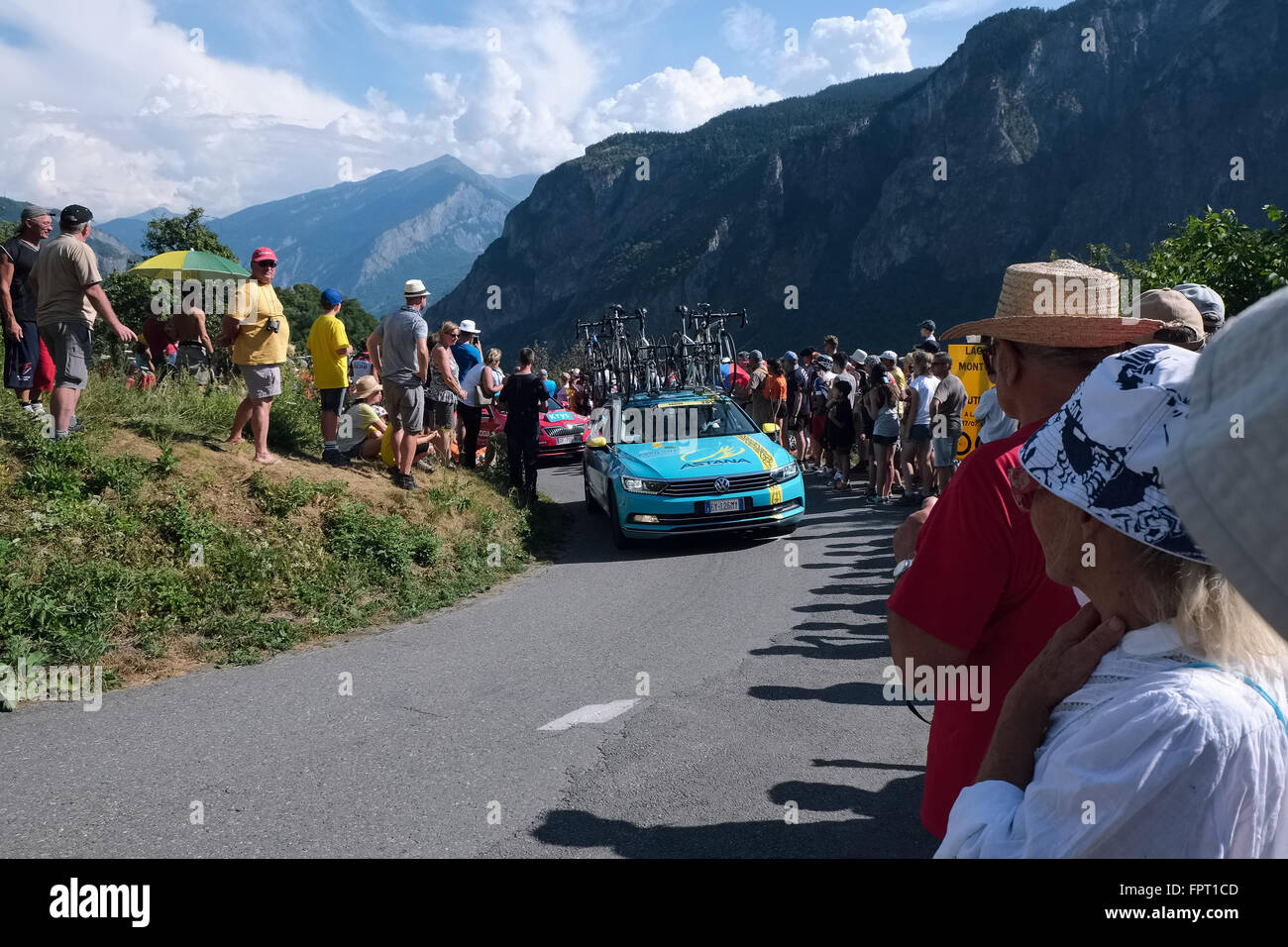 a support car from the Astana team in a hair pin turn in the tour de france 2015 Stock Photo