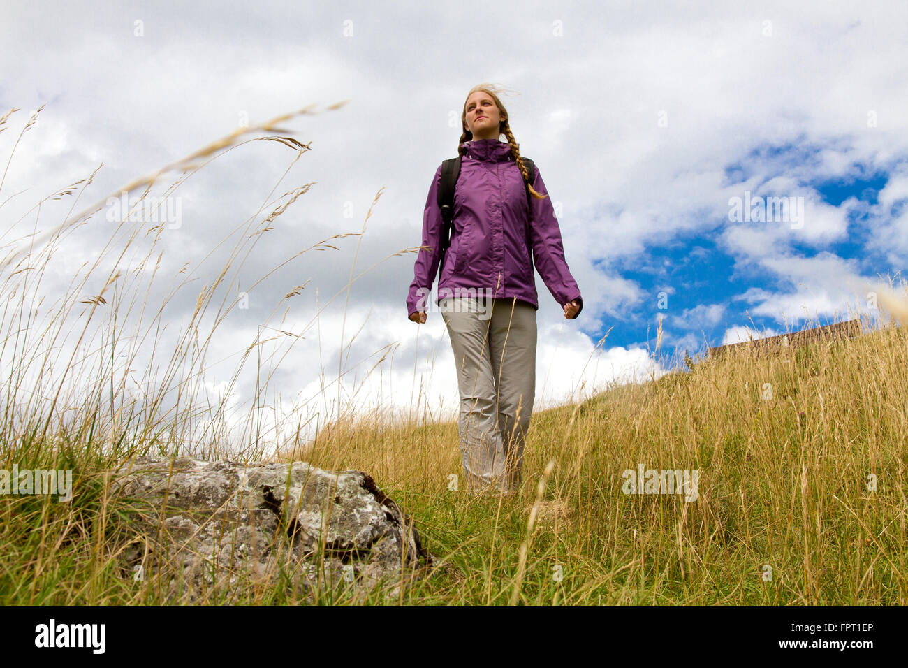 Young woman hiking in nature Stock Photo