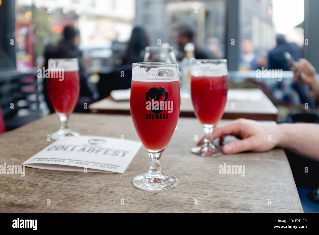 red fruit beer in a brewdog glass in a bar Stock Photo