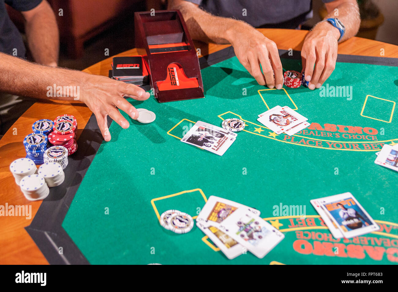 LOS ANGELES, CA AUGUST 08 X Game athletes playing a poker game in