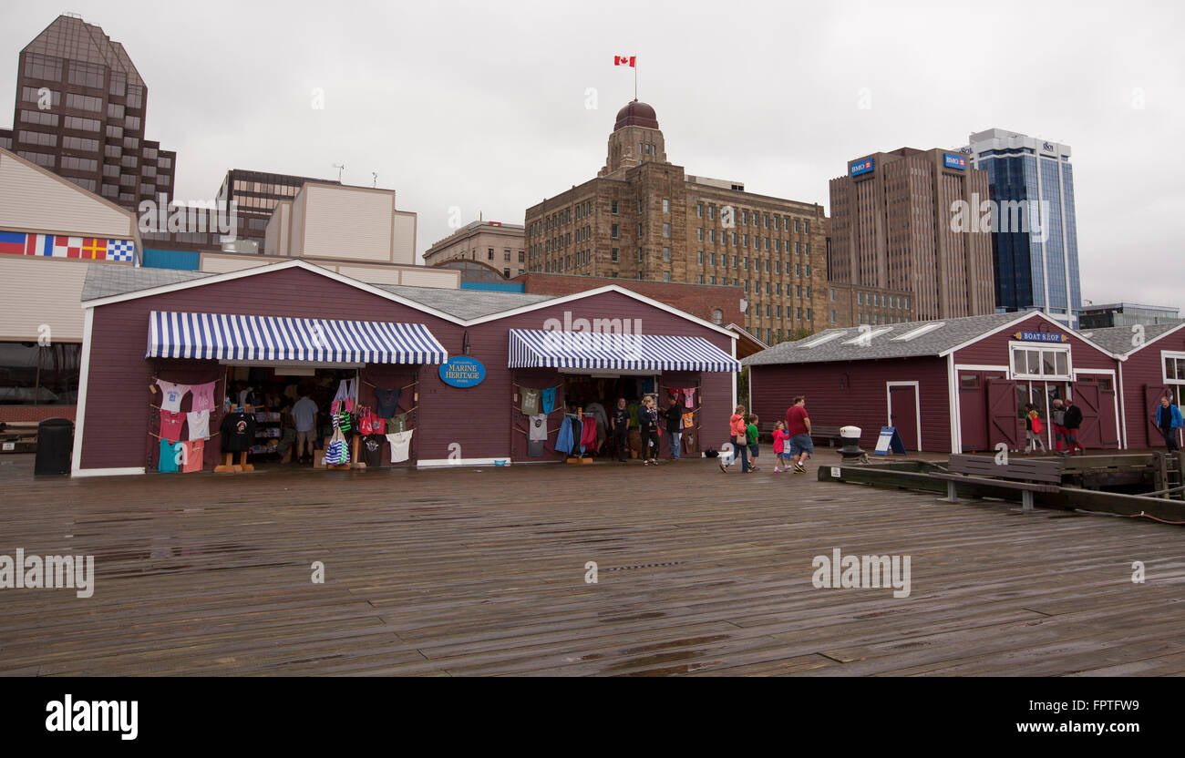 HALIFAX - AUGUST 23, 2013: The Halifax Waterfront Boardwalk is a public footpath located on the Halifax Harbour waterfront in Ha Stock Photo